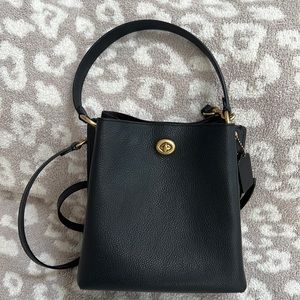 Coach Charlie bucket/crossbody bag.  Black pebbled leather with turnlock. NWOT.